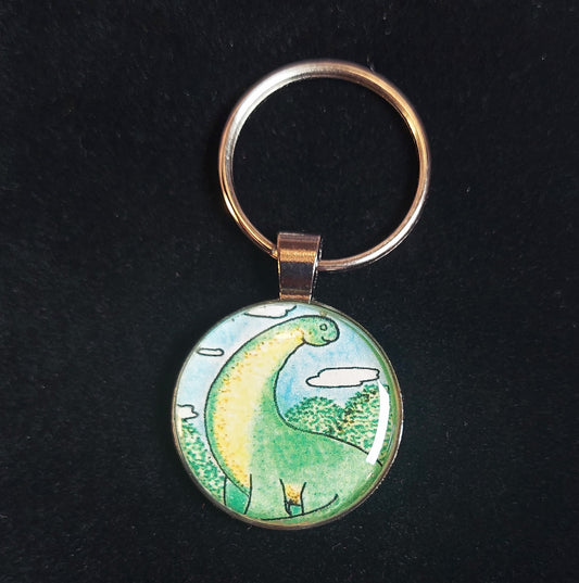 Happy Green Dinosaur With His HeadcIn the Clouds Keychain/Pendant With Waxed Chord